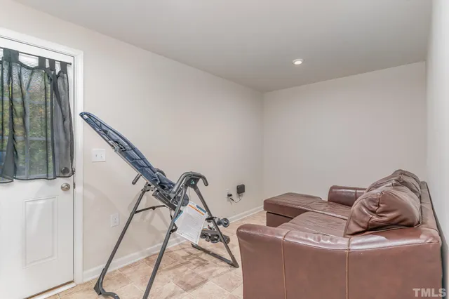 a view of a house with outdoor seating