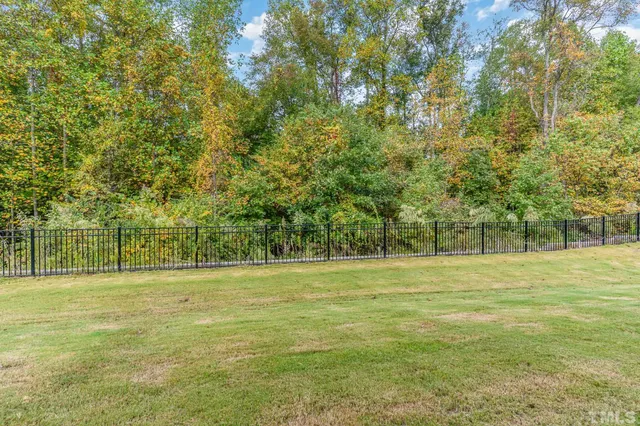 a front view of a building with swimming pool