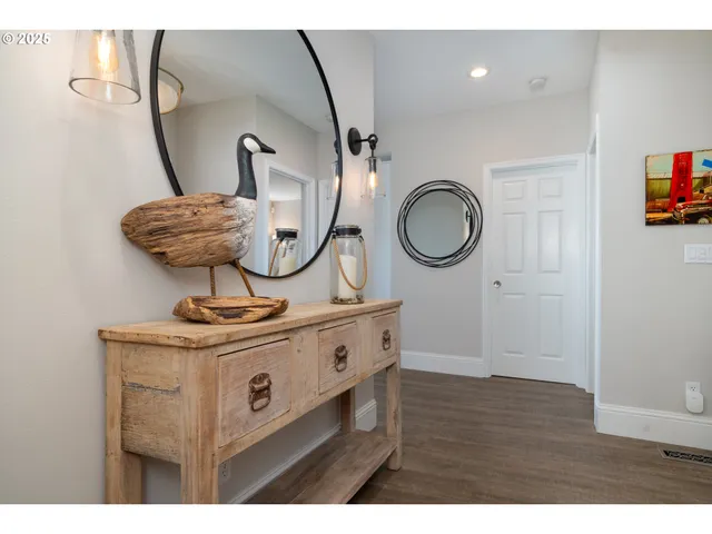 a open kitchen with cabinets stove and sink