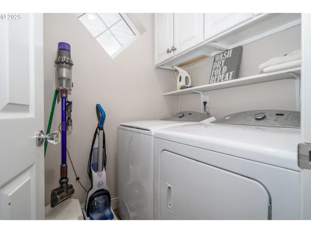 a view of room with window and stairs