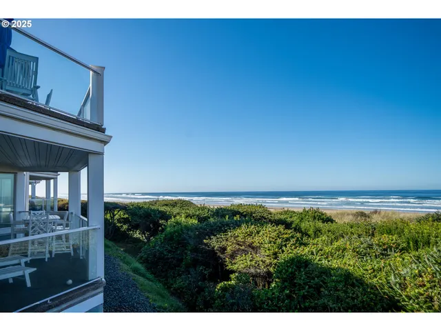 an aerial view of a house with a garden