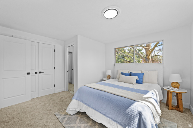 2267 West 4350th Street South Roy, UT 84067 - Photo 14 of 32 Bedroom featuring light carpet and a closet
