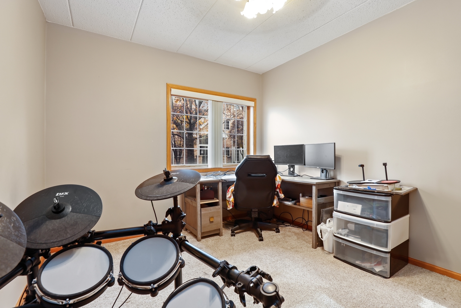 7825 Bristol Park Drive, Unit 1C Tinley Park, IL 60477 - Photo 15 of 22 a view of a workspace with furniture and a window