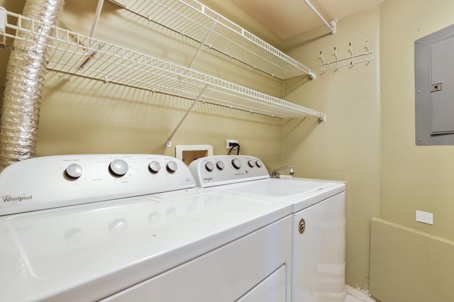 7825 Bristol Park Drive, Unit 1C Tinley Park, IL 60477 - Photo 17 of 22 a utility room with dryer and washer