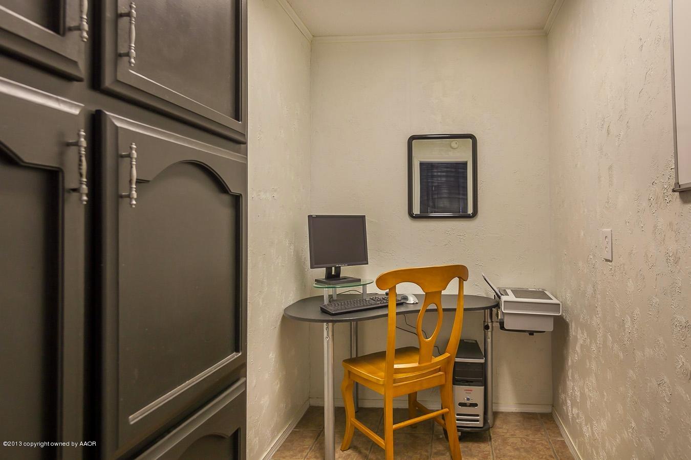5300 South Milam Street Amarillo, TX 79110 - Photo 14 of 21 a view of a workspace with furniture