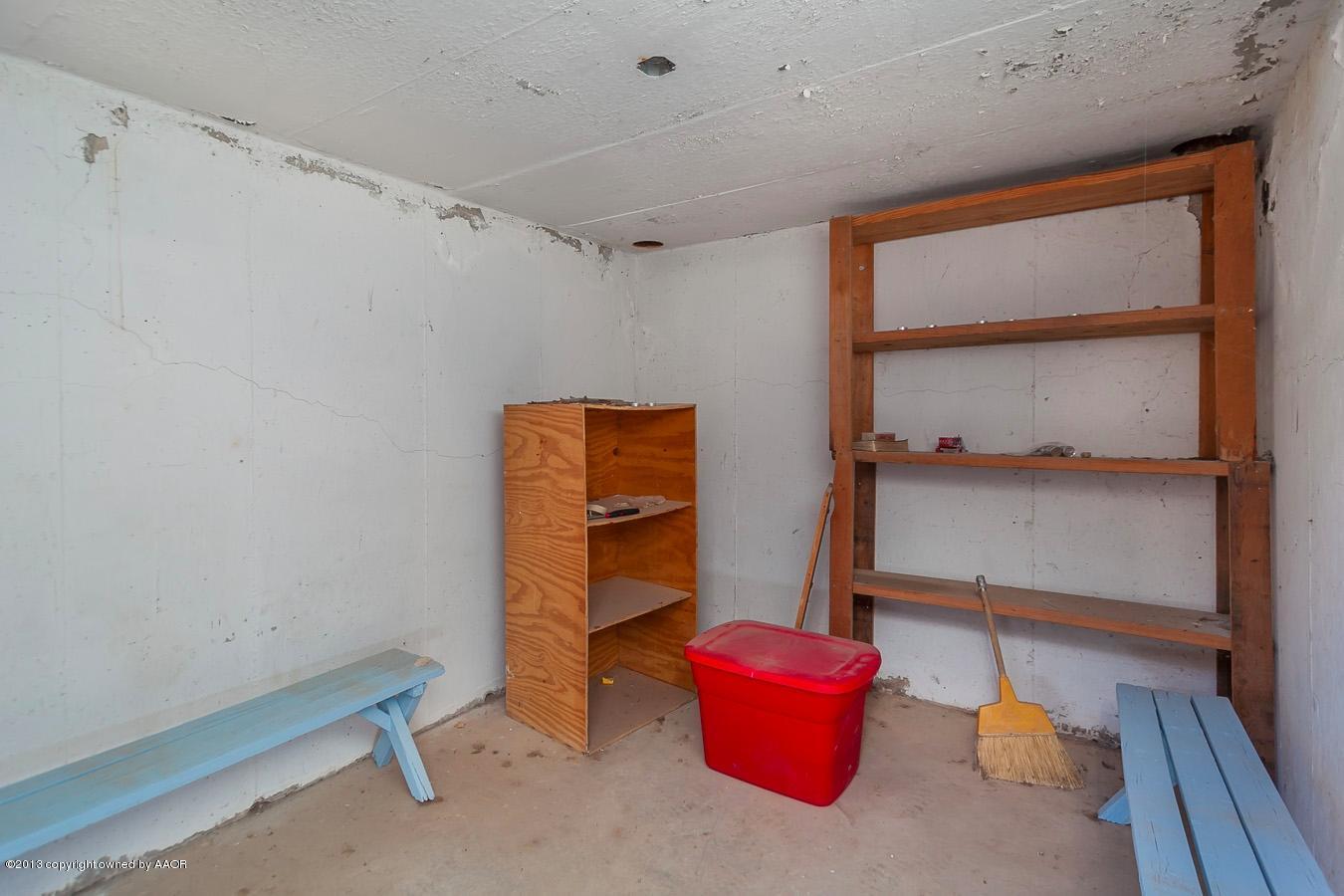 5300 South Milam Street Amarillo, TX 79110 - Photo 21 of 21 a room with furniture and a window