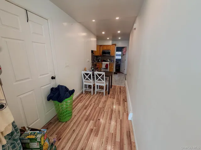 a room with furniture and wooden floor