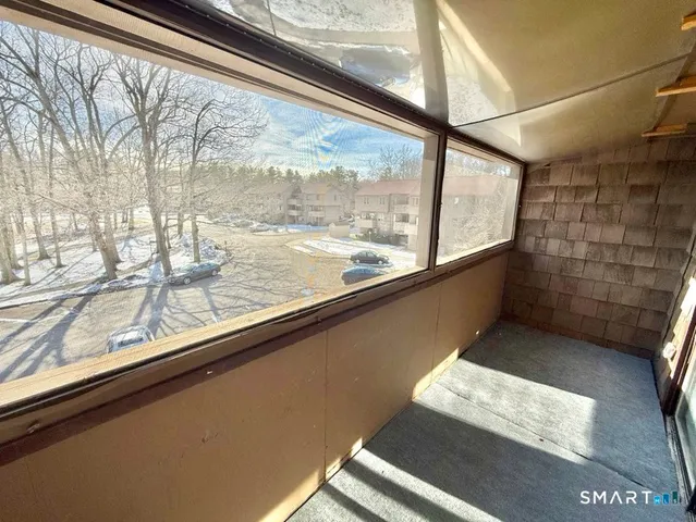 a kitchen with stainless steel appliances granite countertop a refrigerator and a stove
