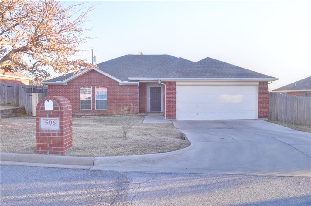 506 Summer Tree Lane Springtown, TX 76082 - Photo 1 of 1 a front view of a house with a yard and garage