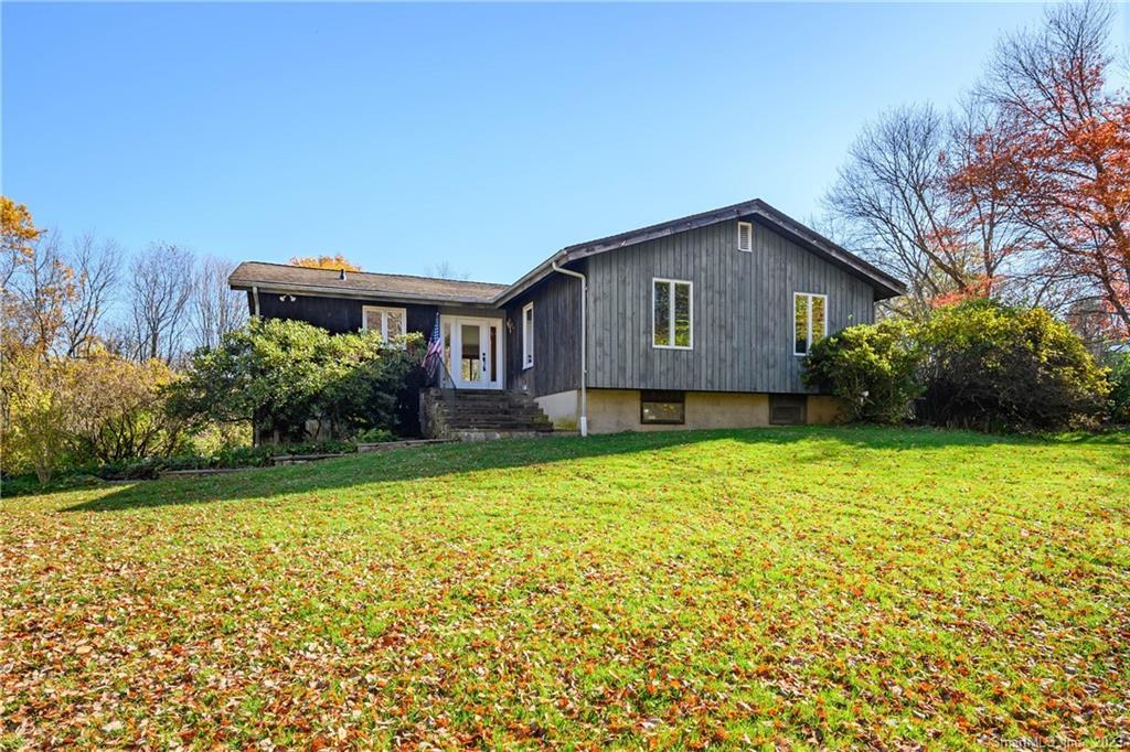 127 Picketts Ridge Road Redding, CT 06896 - Photo 1 of 1 a house view with a outdoor space