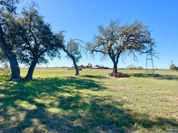 a view of swimming pool with a yard