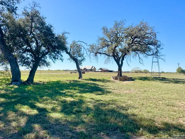 a view of swimming pool with a yard