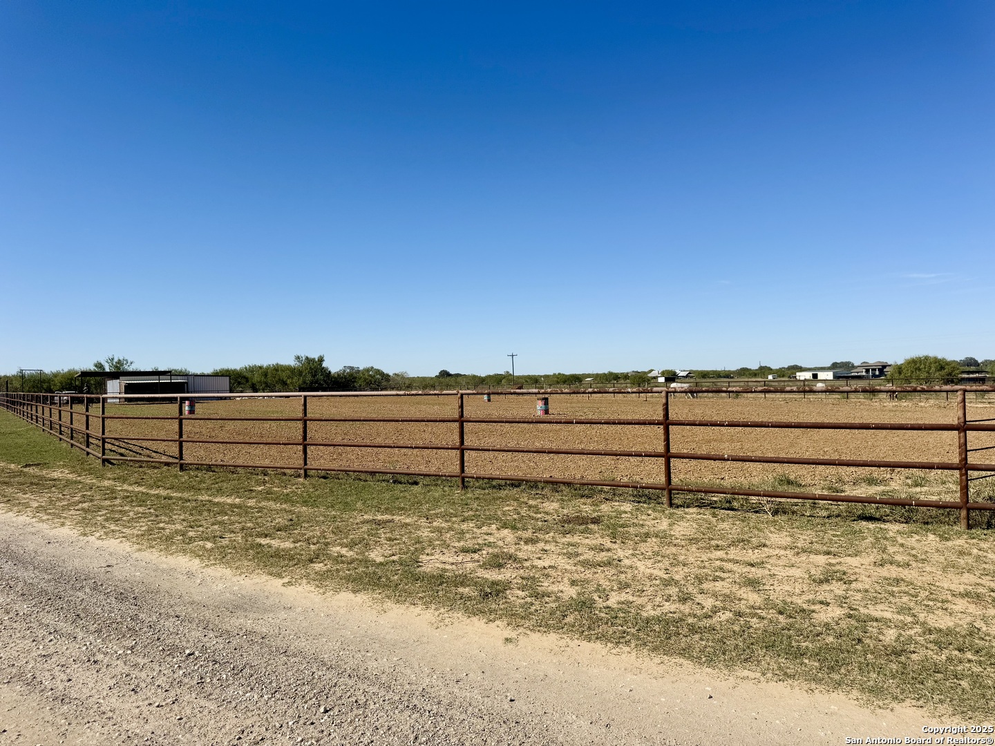 16489 Farm To Market Road 472 Devine, TX 78016 - Photo 27 of 31 a view of a yard