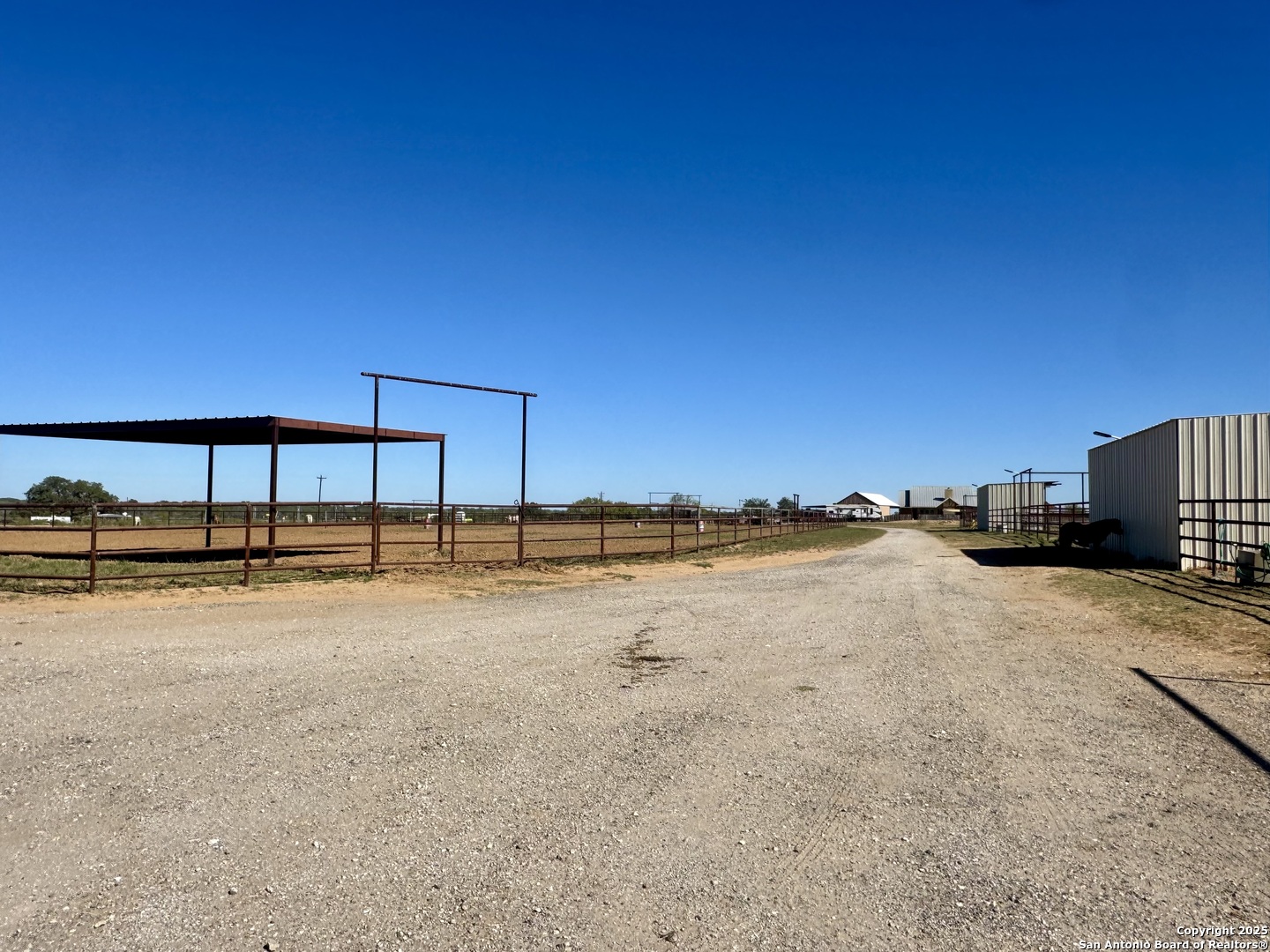 16489 Farm To Market Road 472 Devine, TX 78016 - Photo 29 of 31 a view of a lake