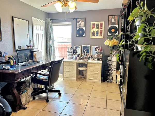 a view of a workspace with furniture