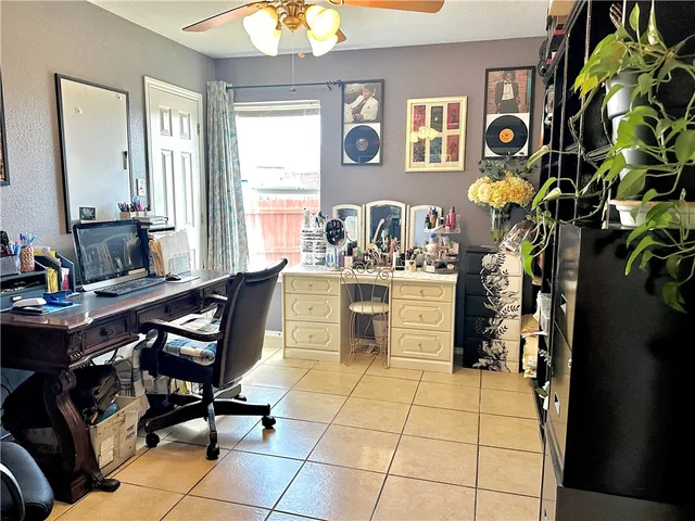 a view of a workspace with furniture
