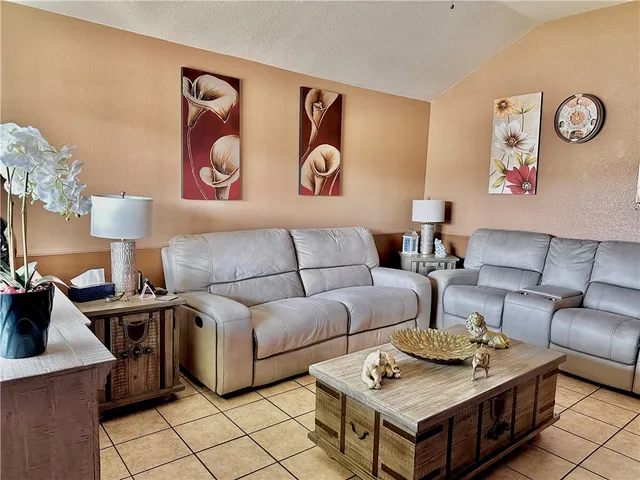 a front view of a house with seating space