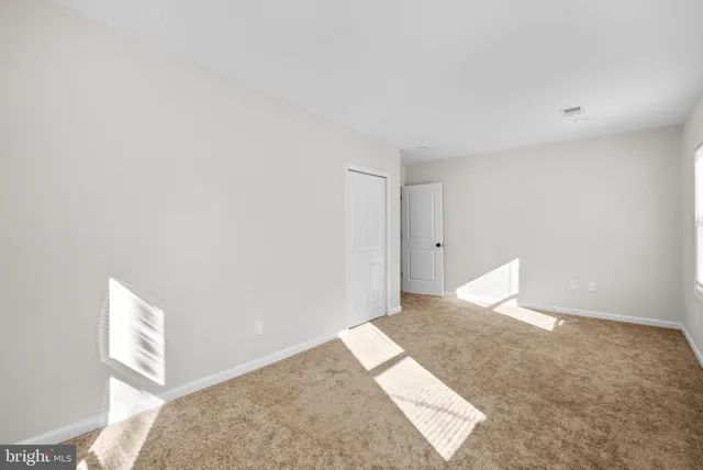 a view of a big room with closet