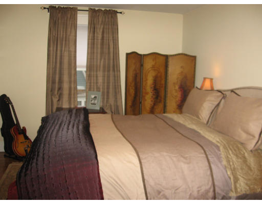 19 Waldorf Road Newton, MA 02461 - Photo 11 of 18 a bed sitting in a bedroom next to a window