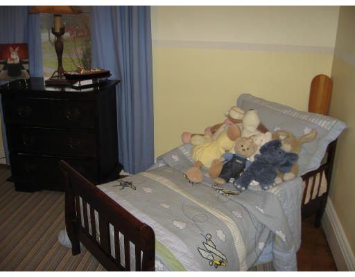 19 Waldorf Road Newton, MA 02461 - Photo 12 of 18 a bedroom with a bed and teddy bear on a bed