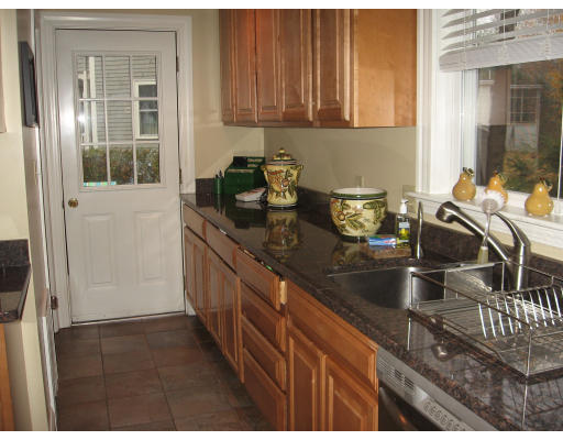 19 Waldorf Road Newton, MA 02461 - Photo 3 of 18 a kitchen with sink and refrigerator