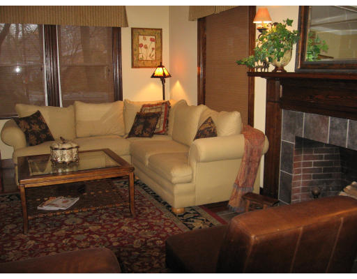 19 Waldorf Road Newton, MA 02461 - Photo 6 of 18 a living room with furniture and a fireplace