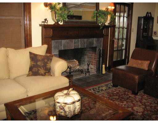 19 Waldorf Road Newton, MA 02461 - Photo 7 of 18 a living room with furniture and a fireplace