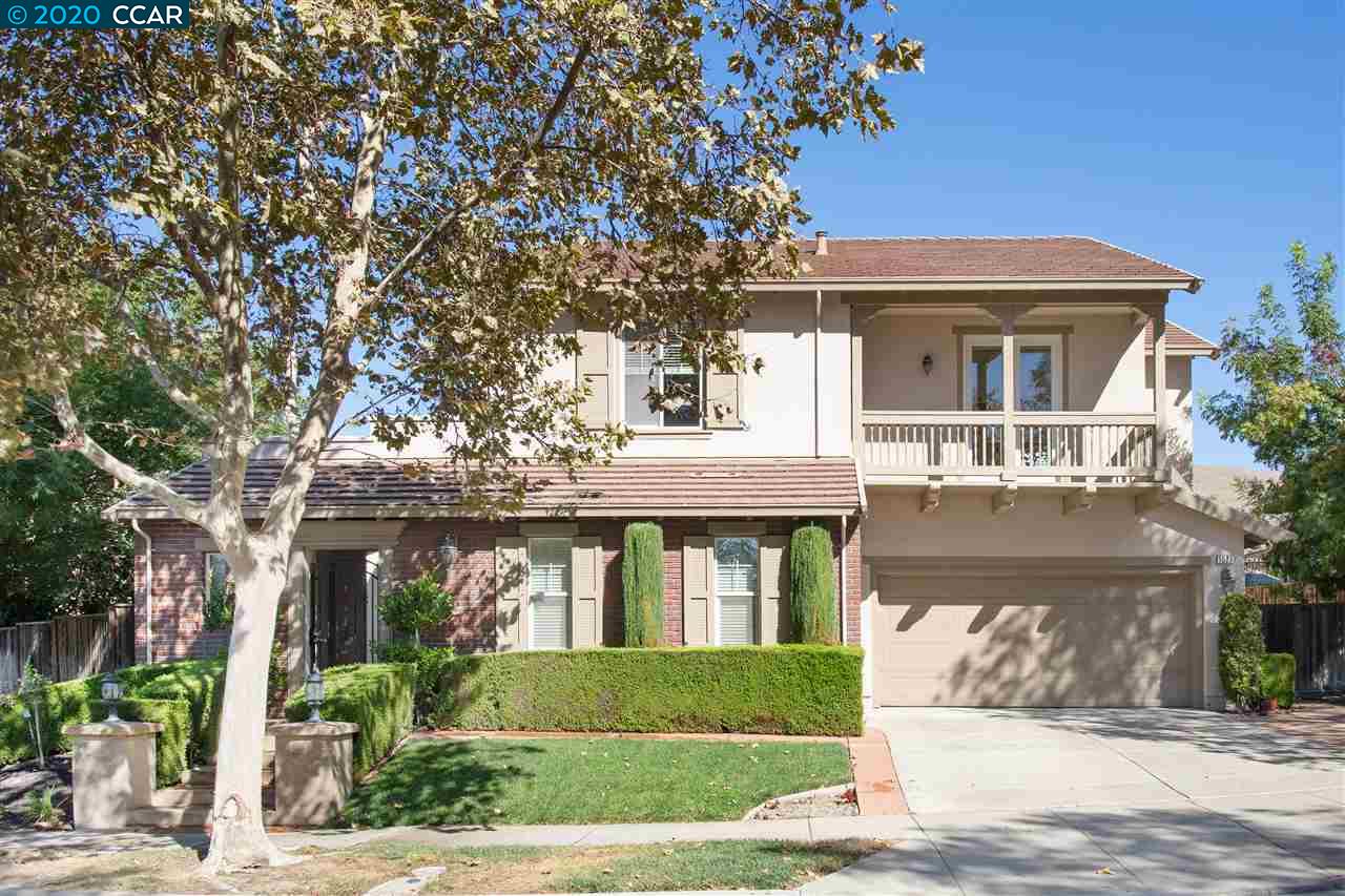 1527 Asterbell Drive San Ramon, CA 94582 - Photo 1 of 1 a front view of a house with a garden