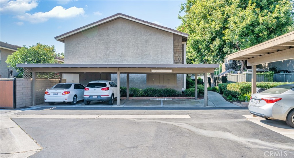 63 Streamwood Irvine, CA 92620 - Photo 24 of 25 a car parked in front of a house