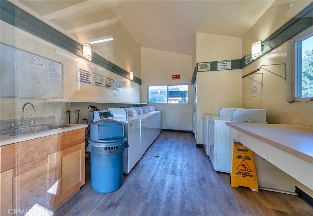63 Streamwood Irvine, CA 92620 - Photo 25 of 25 a kitchen with counter top space and wooden floor