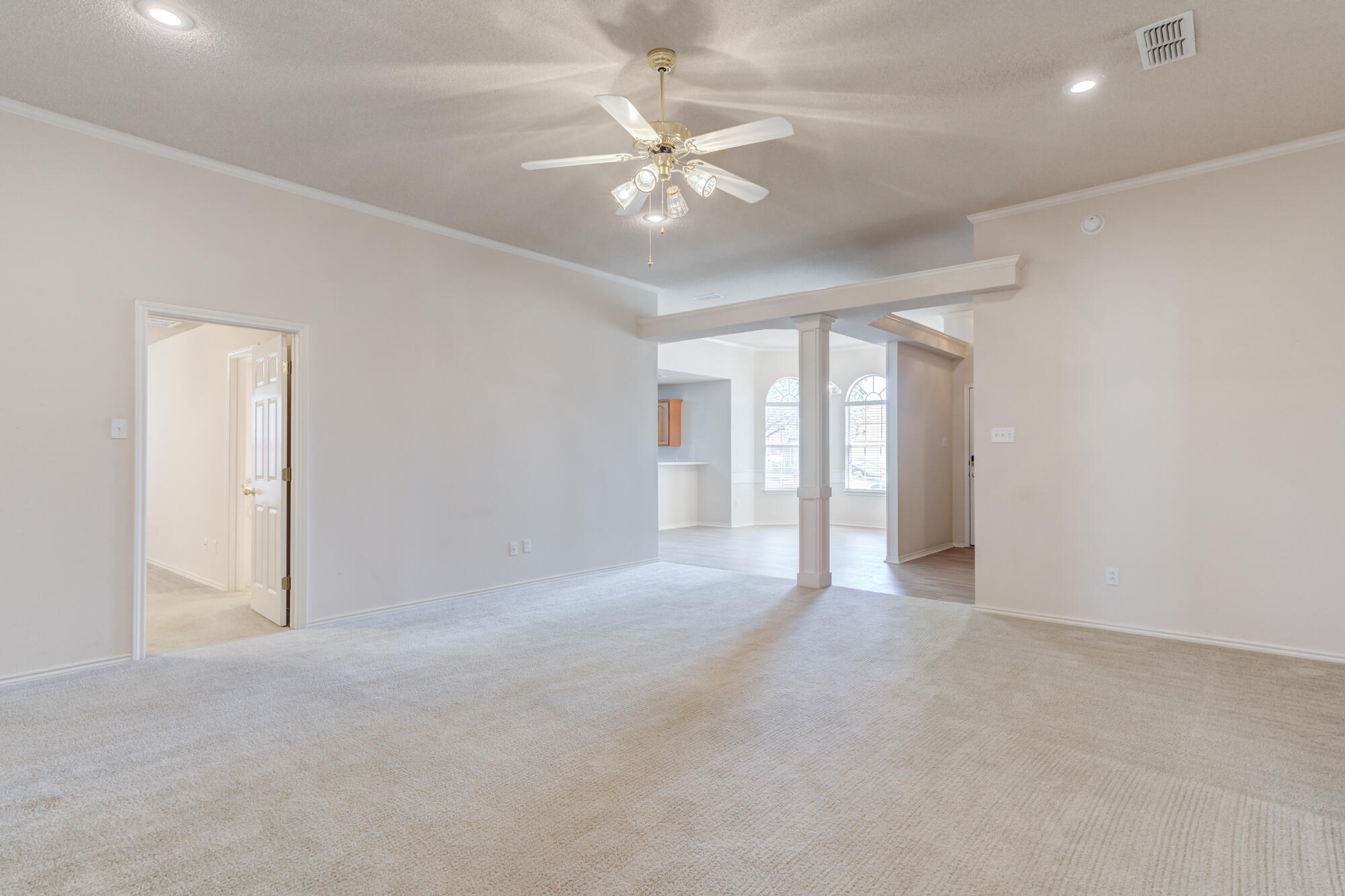 5914 88th Place Lubbock, TX 79424 - Photo 17 of 39 an empty room with fan and ceiling fan