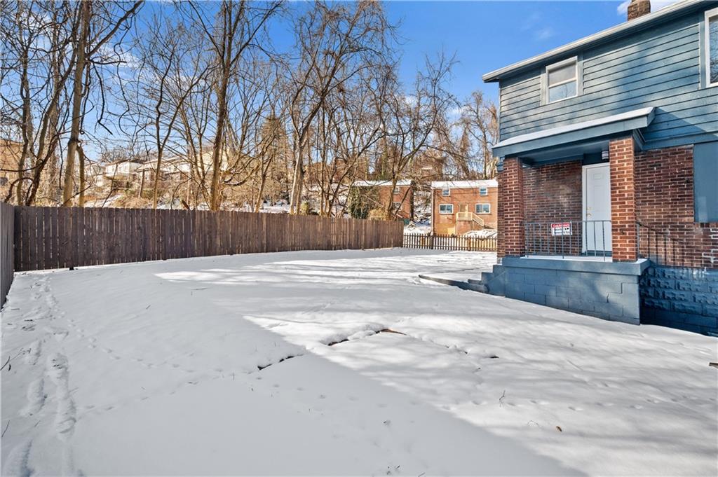1486 Mill Street Pittsburgh, PA 15221 - Photo 23 of 25 a view of a house with a outdoor space