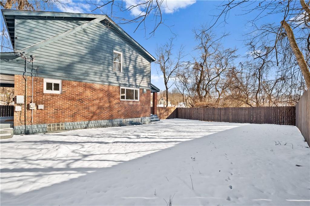 1486 Mill Street Pittsburgh, PA 15221 - Photo 24 of 25 a view of a backyard of the house