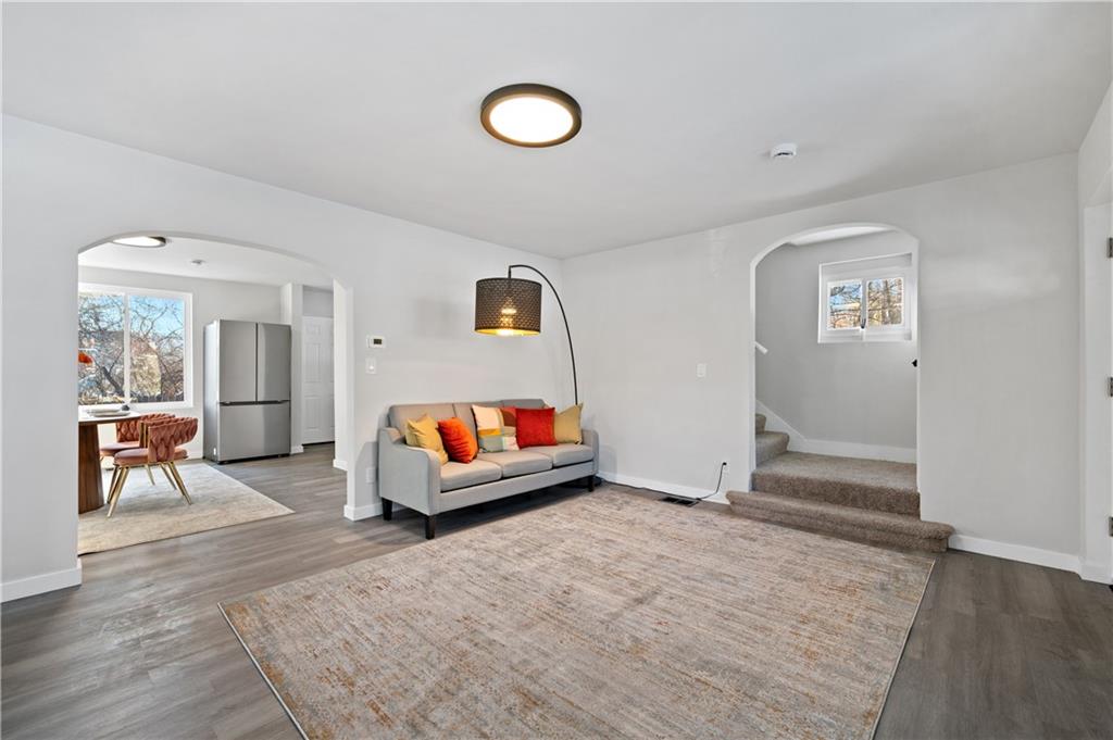 1486 Mill Street Pittsburgh, PA 15221 - Photo 5 of 25 a living room with furniture and a window