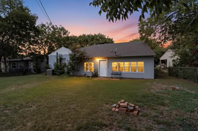 a view of a house with a garden