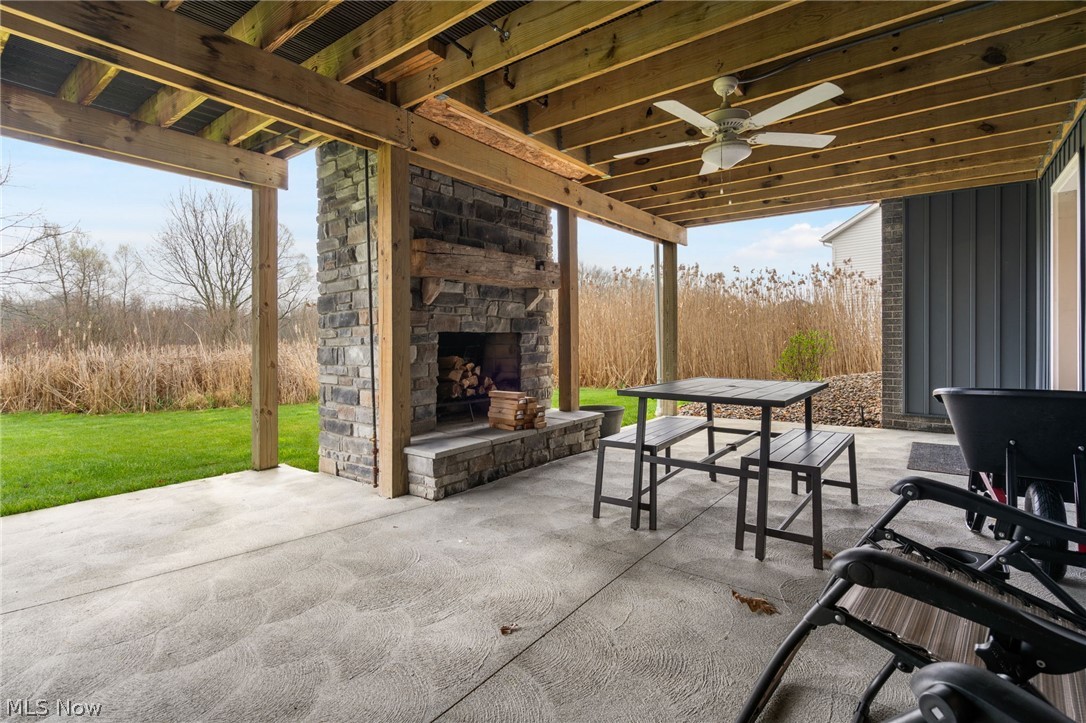 2062 Summerchase Road Northeast Canton, OH 44721 - Photo 34 of 39 Lower level patio with fireplace