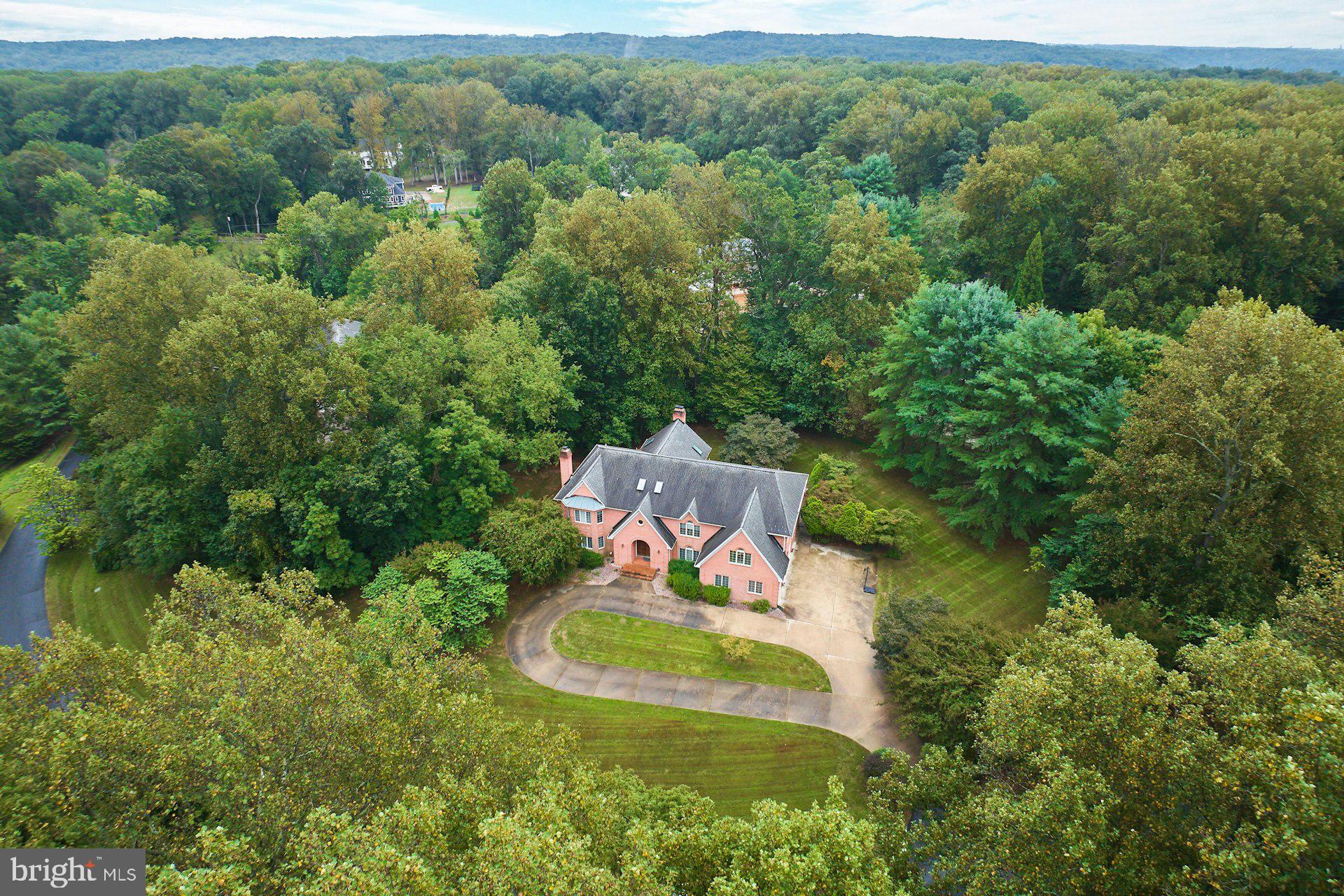 9113 Jeffery Road Great Falls, VA 22066 - Photo 14 of 31 an aerial view of a house with a yard