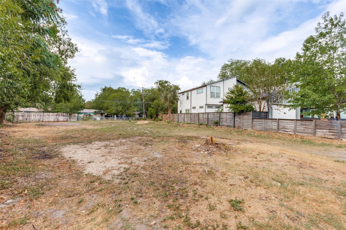 6806 Cruz Street Austin, TX 78741 - Photo 9 of 9 a backyard of a house with lots of green space