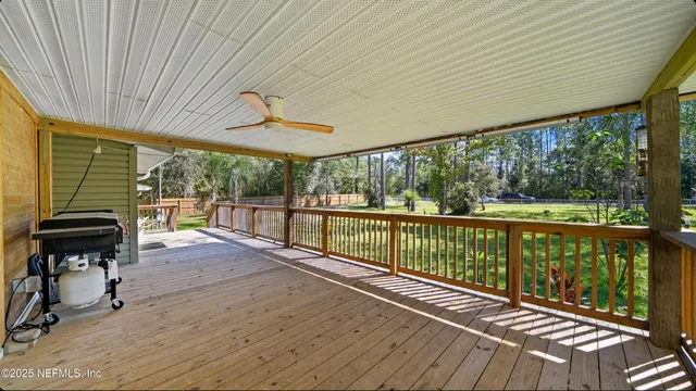 a view of a pool with a yard