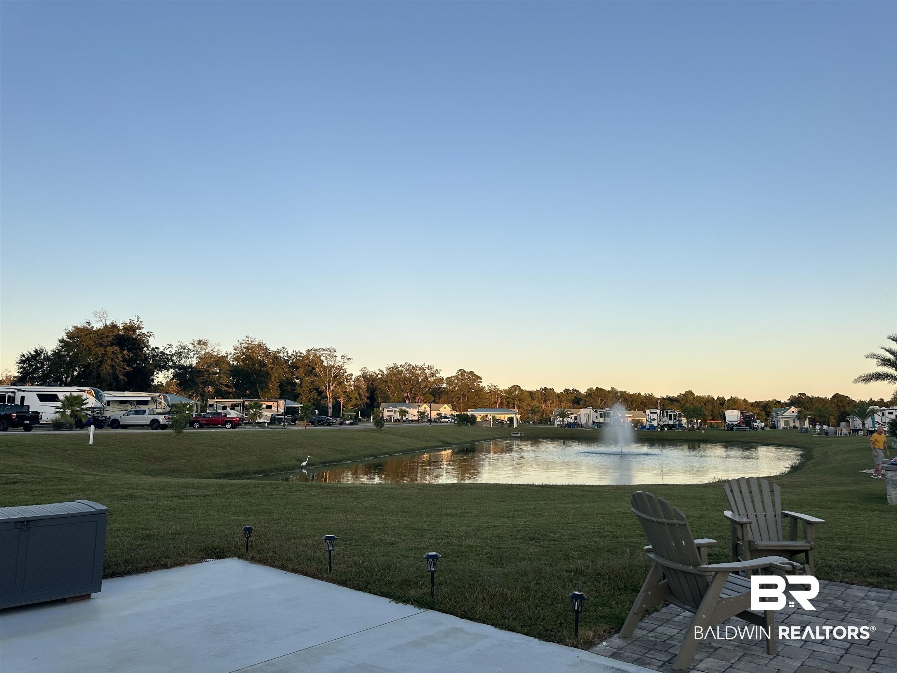 28121 Migratory Way Elberta, AL 36530 - Photo 20 of 51 Yard at dusk with a water view