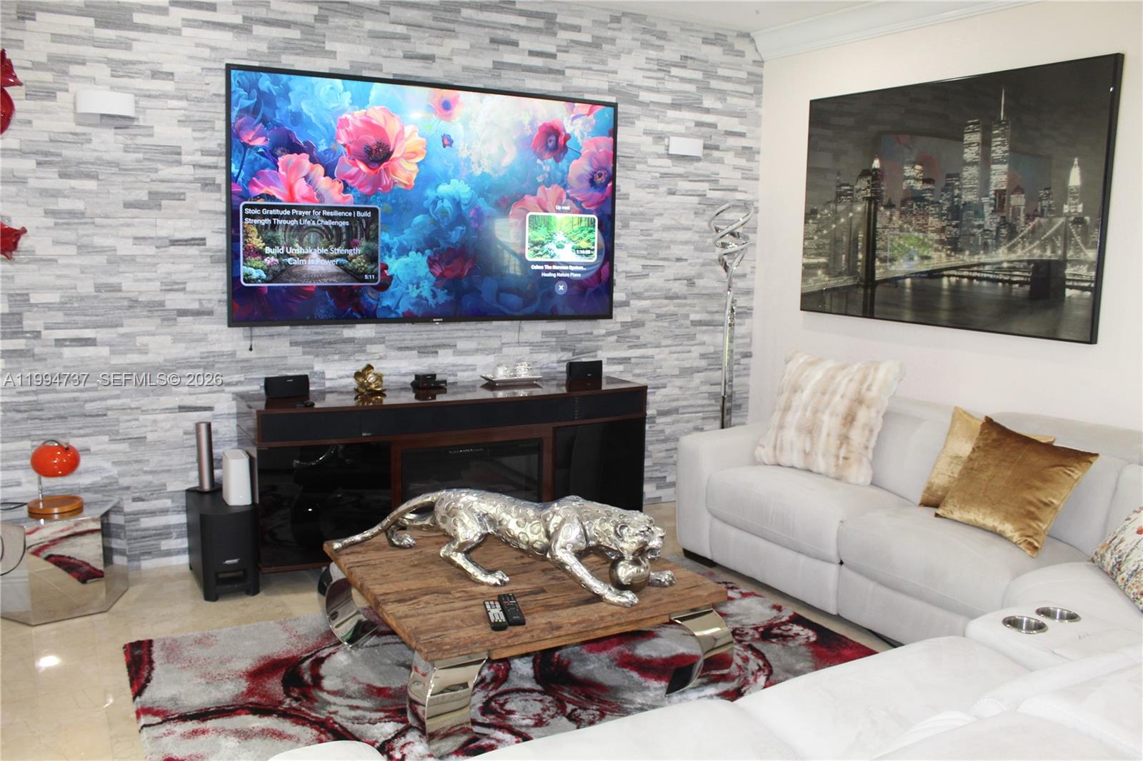 15580 Southwest 176th Terrace Miami, FL 33187 - Photo 11 of 32 a living room with furniture and painting on the wall