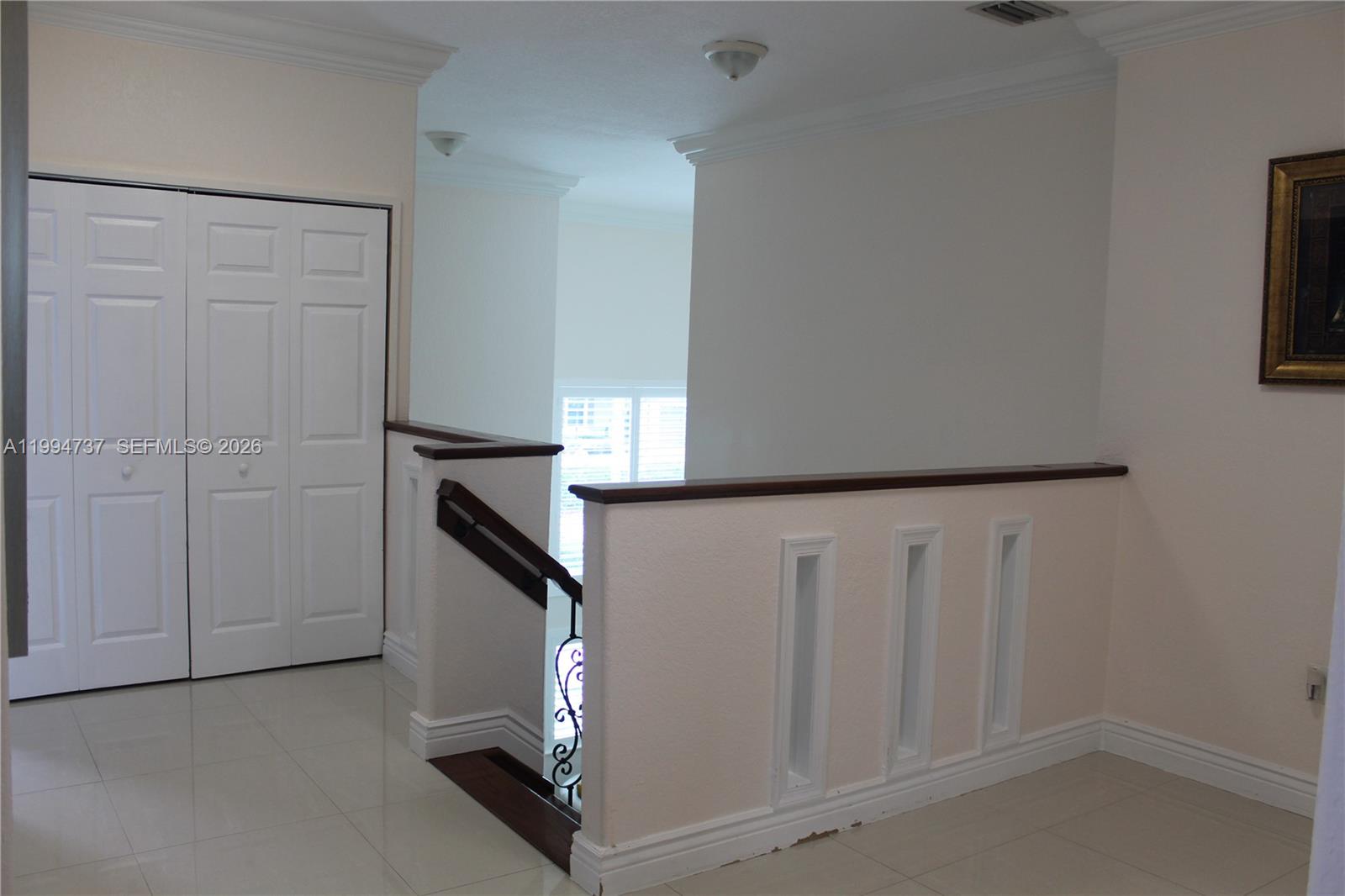 15580 Southwest 176th Terrace Miami, FL 33187 - Photo 17 of 32 a view of an entryway with stairs