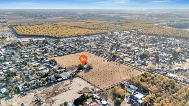 an aerial view of residential house and ocean