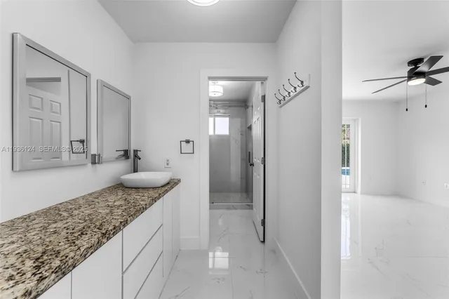 a bathroom with a shower and toilet