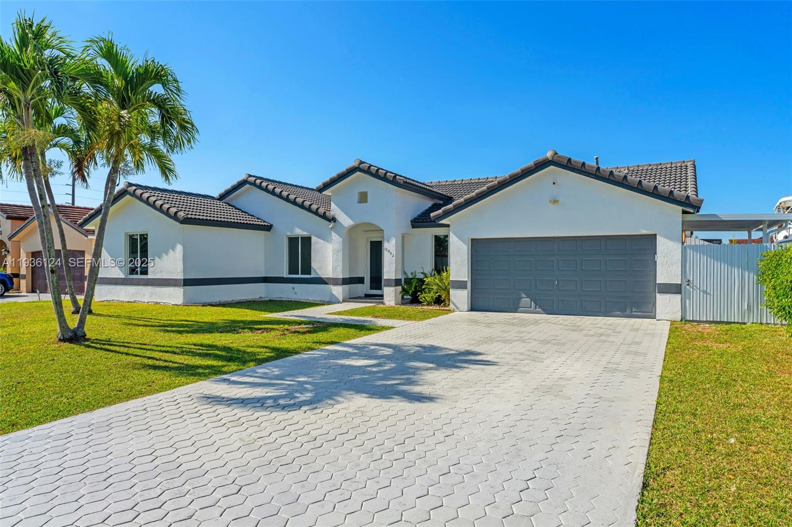 15042 Southwest 149th Court, Unit 1 Miami, FL 33196 - Photo 2 of 46 a house with a outdoor space
