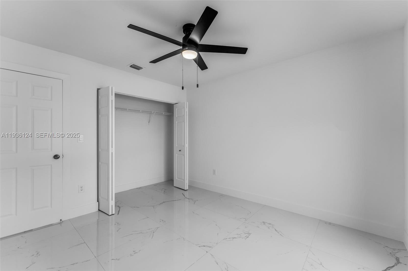 15042 Southwest 149th Court, Unit 1 Miami, FL 33196 - Photo 23 of 46 an empty room