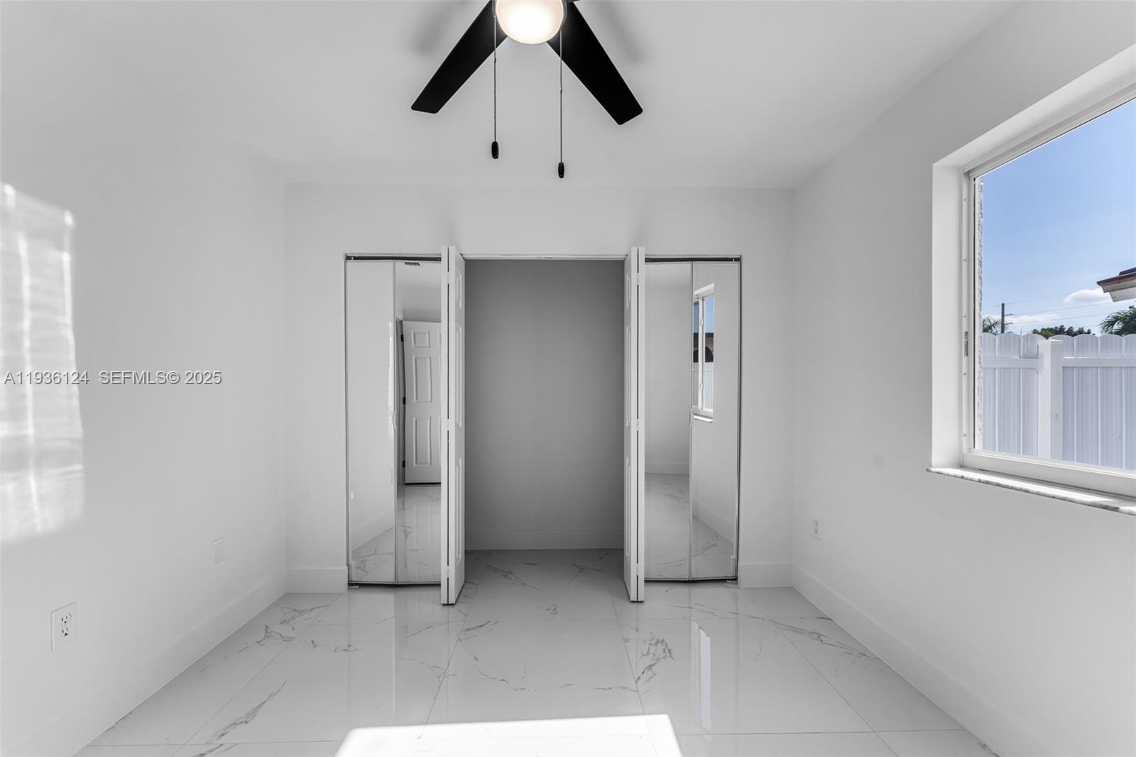 15042 Southwest 149th Court, Unit 1 Miami, FL 33196 - Photo 25 of 46 a view of an empty room