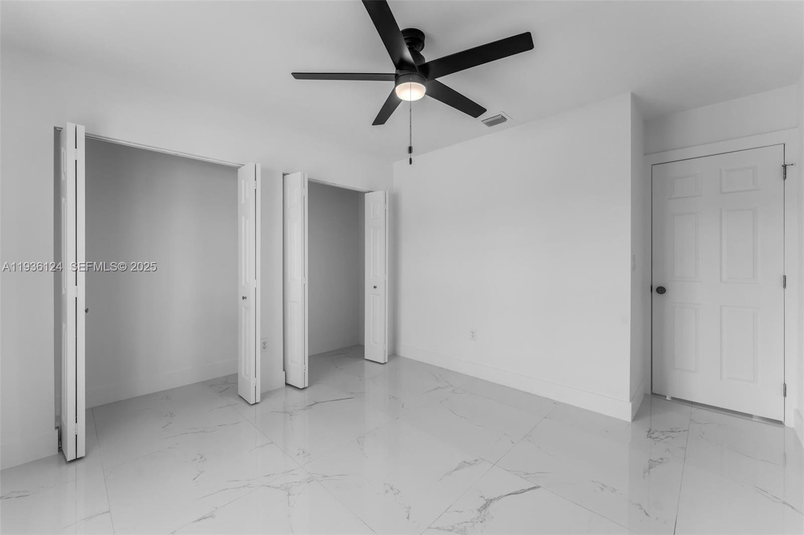 15042 Southwest 149th Court, Unit 1 Miami, FL 33196 - Photo 27 of 46 a view of an empty room