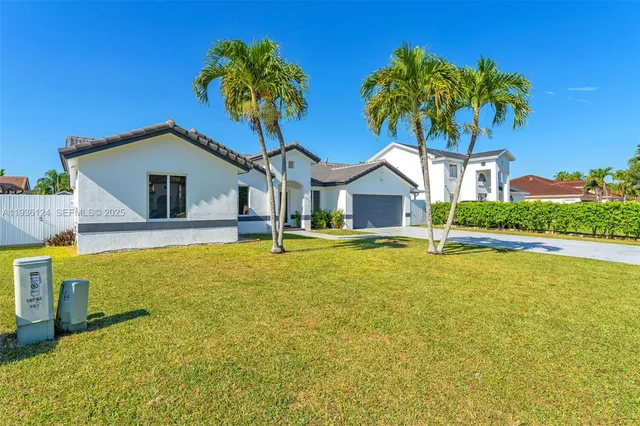 a front view of a house with swimming pool