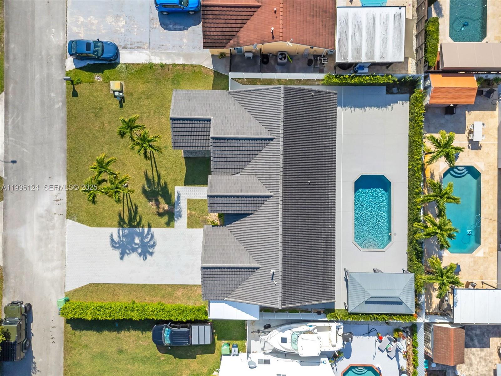15042 Southwest 149th Court, Unit 1 Miami, FL 33196 - Photo 36 of 46 an aerial view of a house with outdoor space